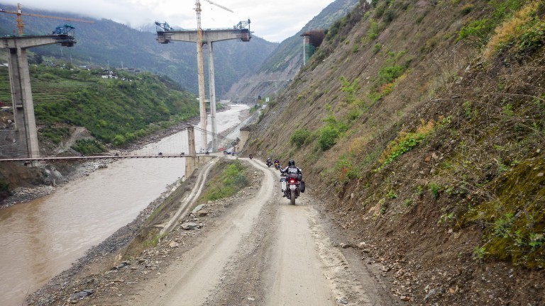 China motorcycle tour group crosses the Mekong River